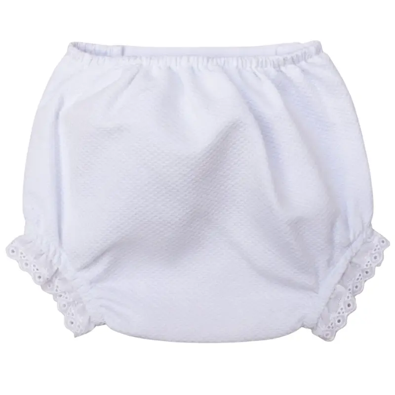 Cubrepañal blanco de Chocolat Baby con detalle bordado en celeste y seis botones delanteros. Visto por detrás