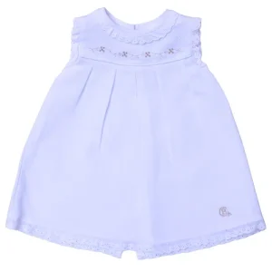 Vestido bebé blanco con bordado dorado – modelo Liverpool de Chocolat Baby. Elegante y cómodo
