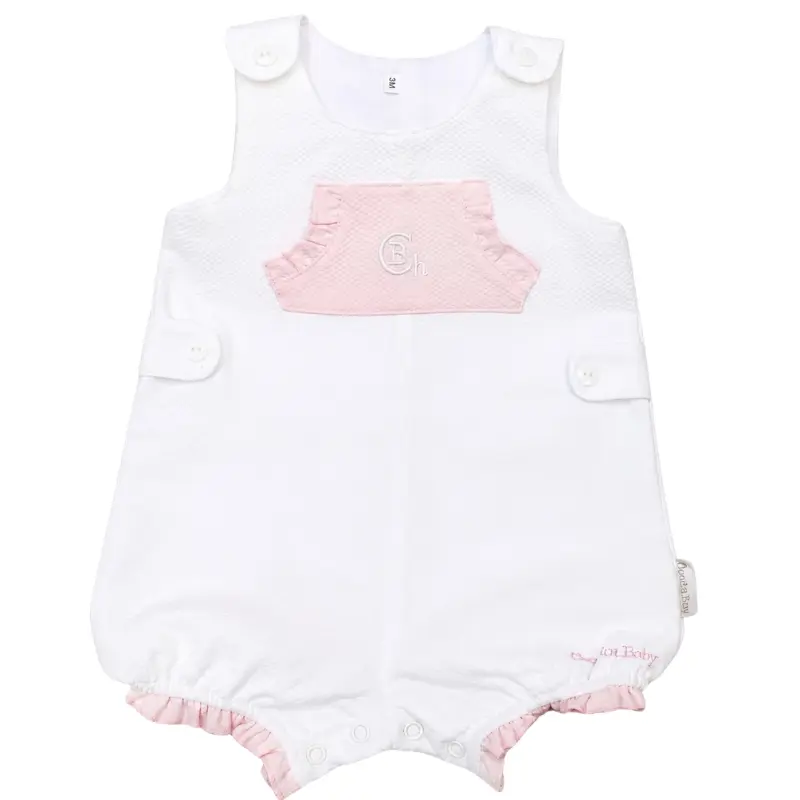 Mono blanco con detalles en rosa de Chocolat Baby, 100% algodón, con botones en tirantes y entrepierna.