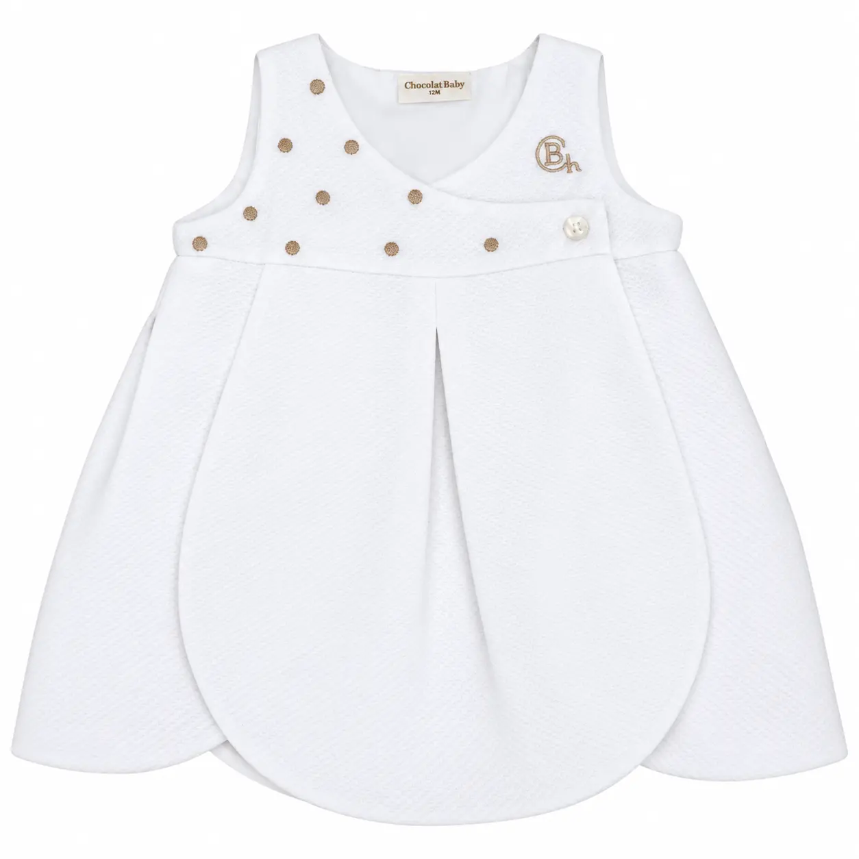 Vestido bebé blanco de piqué Manchester Chocolat Baby con bordado dorado y cierre frontal de botones.